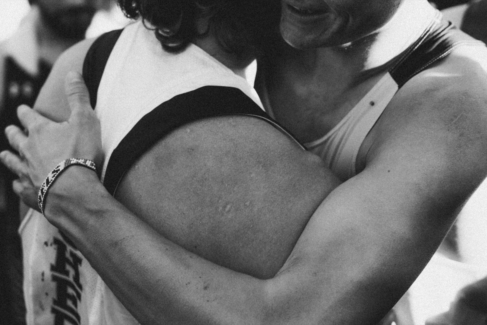 Athletes hugging after finish line